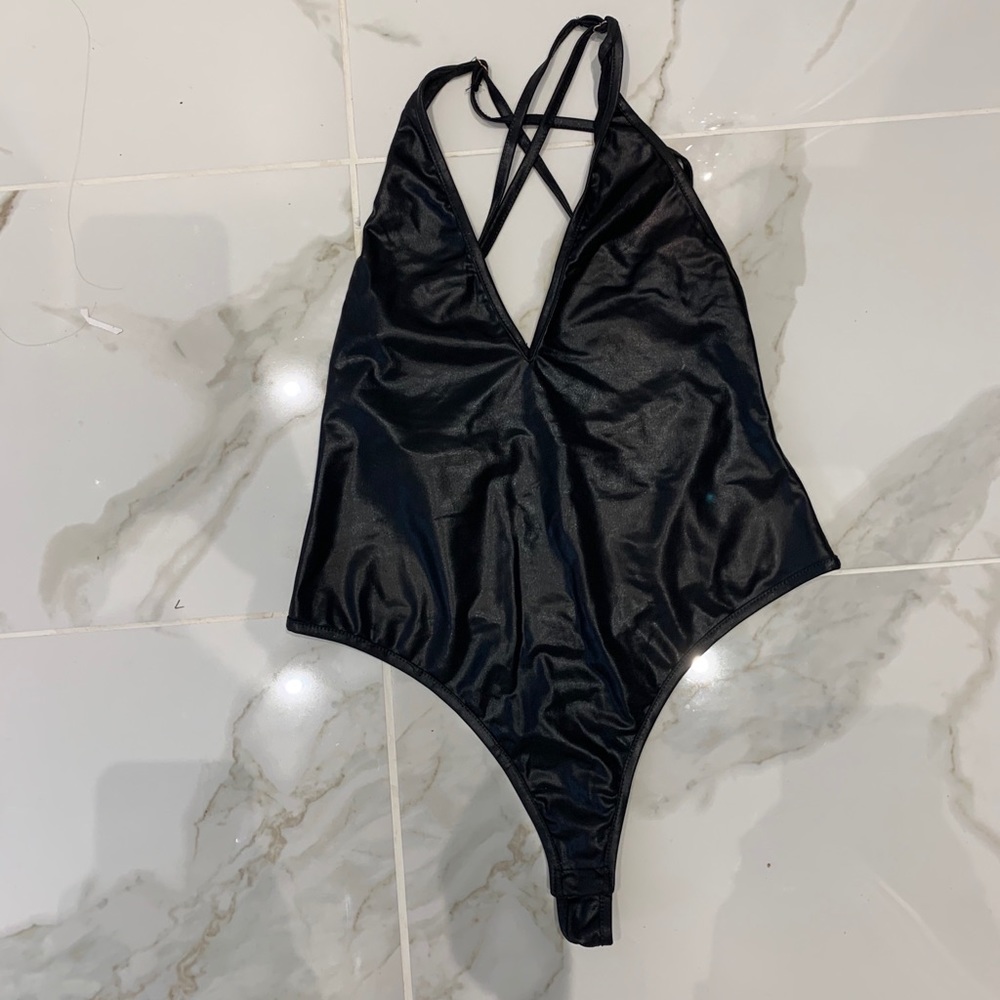 Black shiny body suit